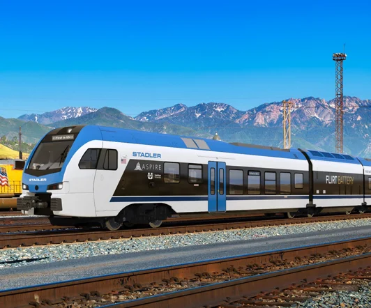 Rendering of a Stadler FLIRT battery-electric passenger train with ASPIRE branding by mountains.